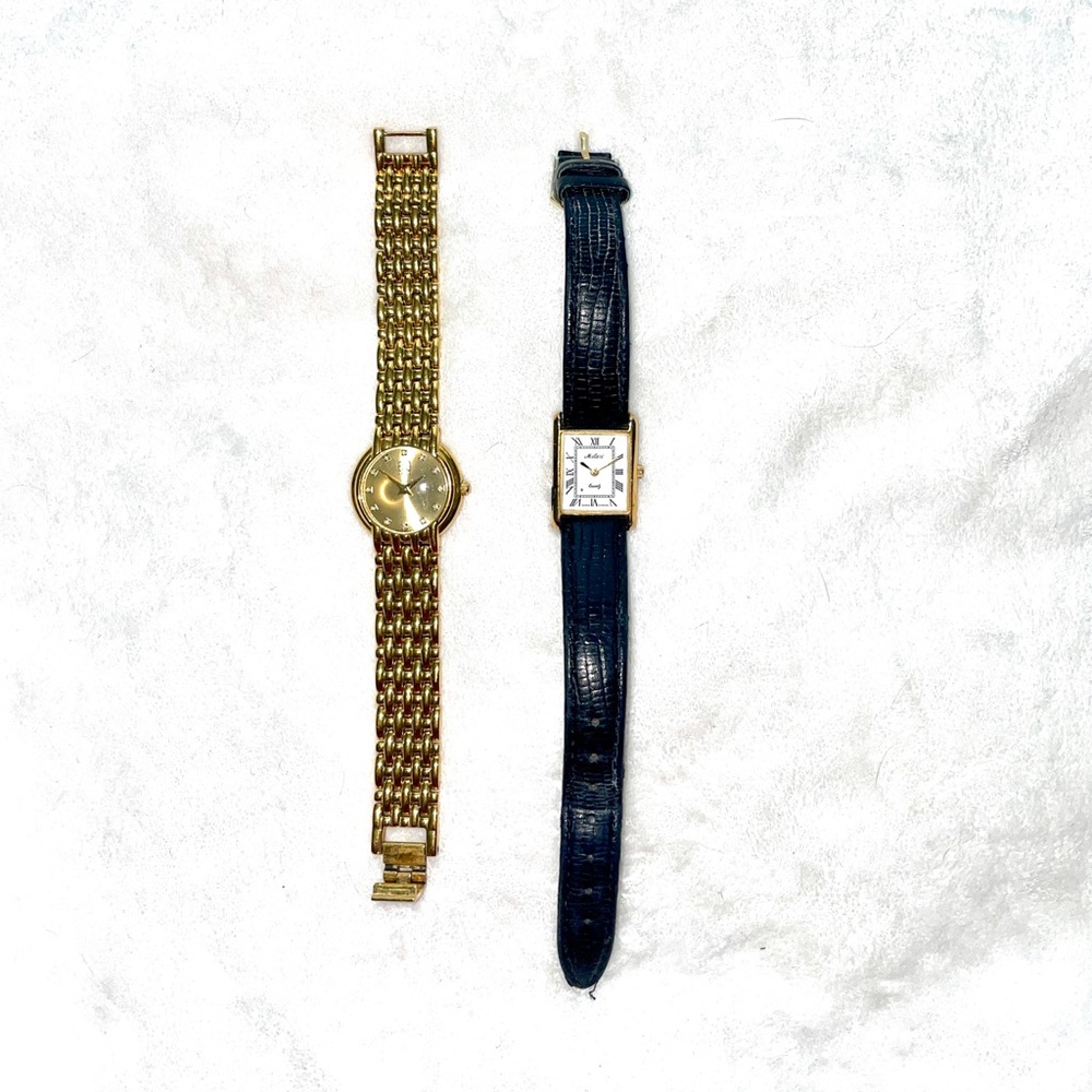 Black leather and gold tone watches for small wrists.